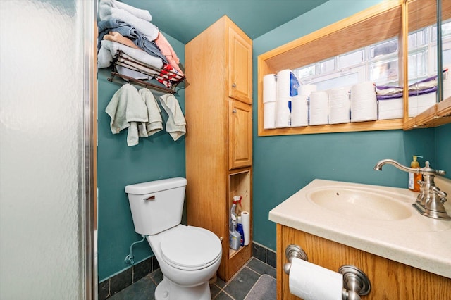 606 N Brainard Ave, La Grange Park, IL 60526 - bathroom featuring vanity, toilet, and tile patterned floors