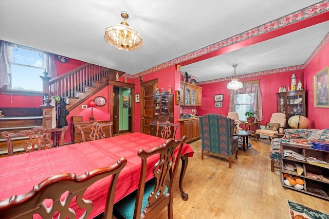 606 N Brainard Ave, La Grange Park, IL 60526 - dining space with a chandelier, healthy amount of natural light, and light wood-style floors