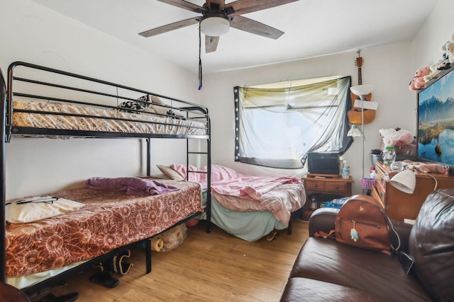 615 Hill Dr Unit 303, Hoffman Estates, IL 60169 - bedroom with wood finished floors and ceiling fan
