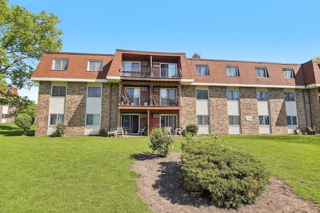 615 Hill Dr Unit 303, Hoffman Estates, IL 60169 - view of apartment building / complex