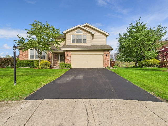 20359 Countryside Ln, Frankfort, IL 60423 - traditional-style house with an attached garage, a front yard, driveway, and brick siding