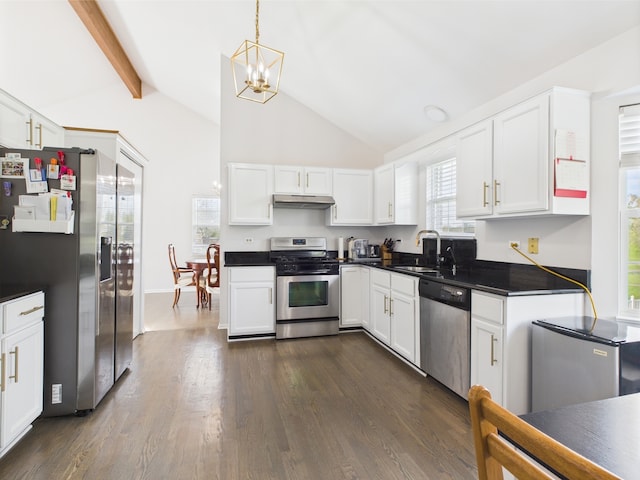 20359 Countryside Ln, Frankfort, IL 60423 - kitchen with dark countertops, a notable chandelier, a sink, stainless steel appliances, and vaulted ceiling with beams