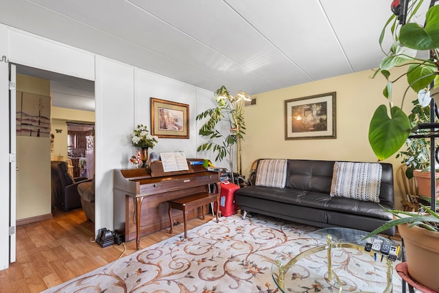 living area featuring light wood-style floors and visible vents