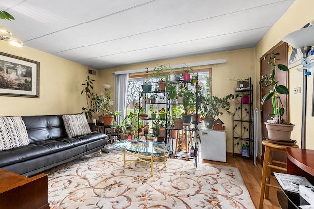 living room with wood finished floors