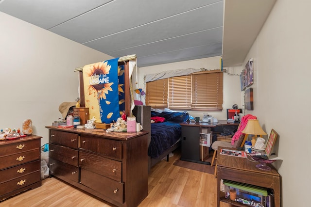 bedroom featuring light wood finished floors
