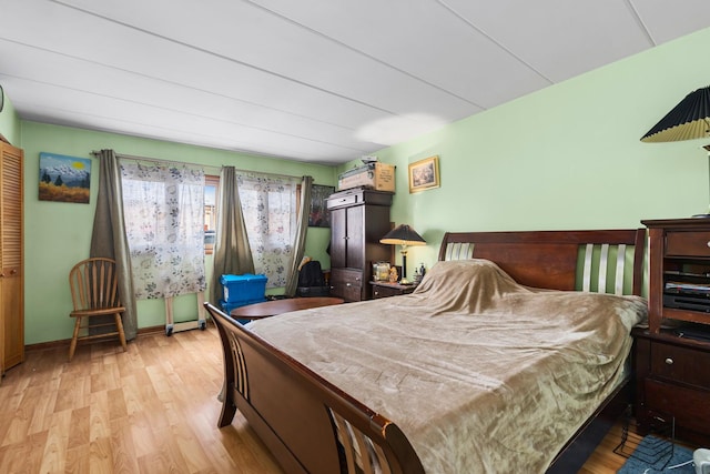 bedroom featuring wood finished floors