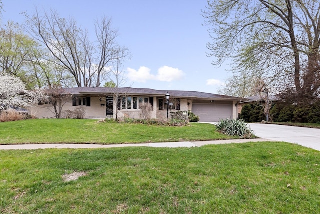single story home with a garage, a front lawn, and driveway