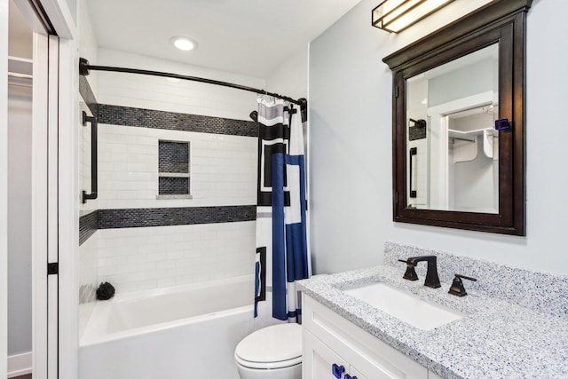bathroom featuring toilet, shower / bath combo with shower curtain, vanity, and recessed lighting
