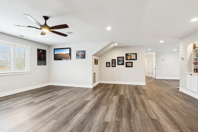 unfurnished living room featuring wood finished floors, ceiling fan, recessed lighting, and baseboards