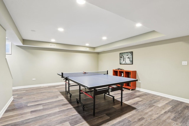 rec room with wood finished floors, baseboards, and recessed lighting