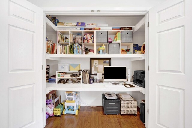 office space featuring wood finished floors