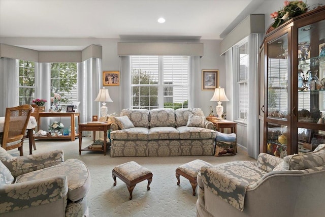 living room featuring carpet floors and recessed lighting