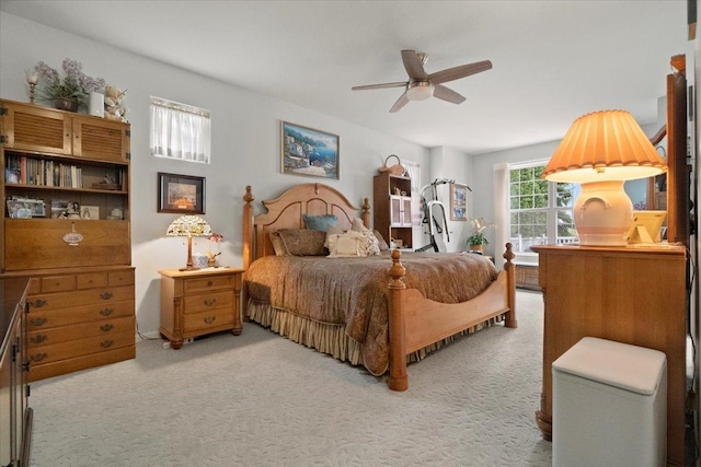 bedroom featuring carpet and a ceiling fan