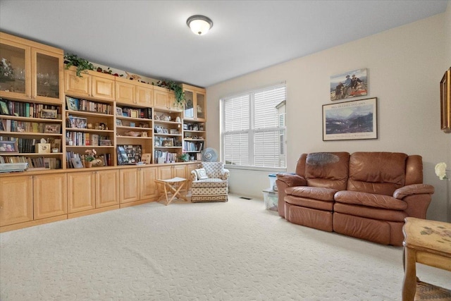 living area featuring carpet floors