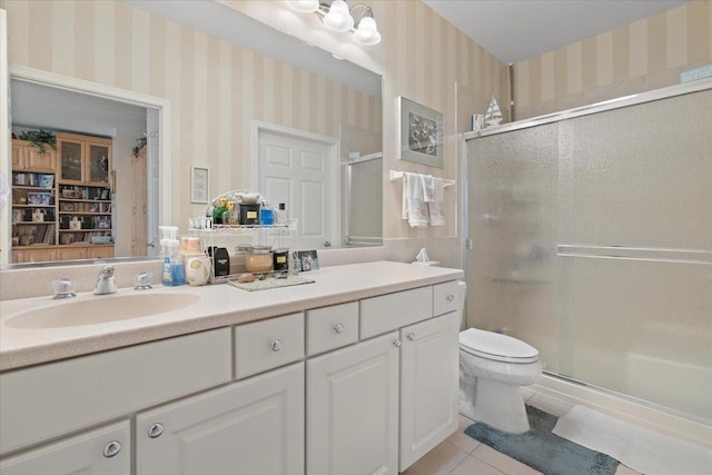 full bath with tile patterned flooring, a stall shower, wallpapered walls, and toilet
