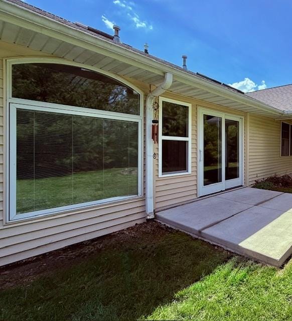 back of property with a patio area