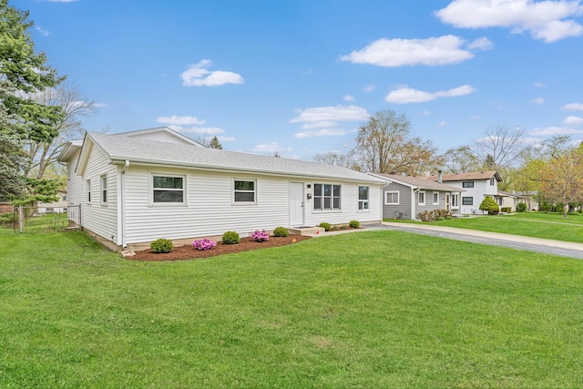 18624 W Pamela Pl, Gurnee, IL 60031 - ranch-style house with a front lawn, fence, and concrete driveway