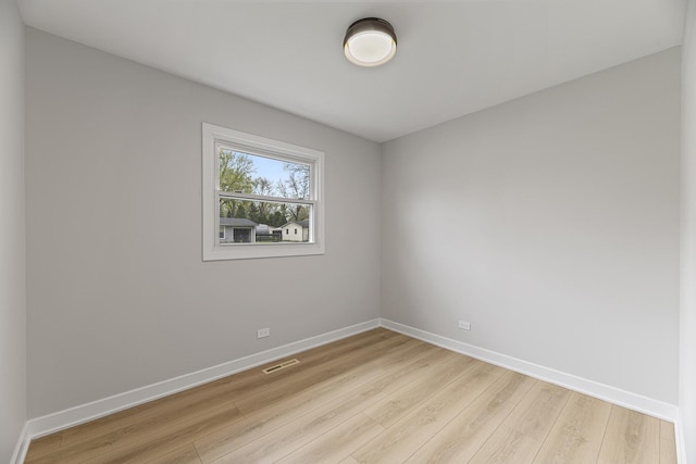 18624 W Pamela Pl, Gurnee, IL 60031 - empty room featuring baseboards, visible vents, and light wood-type flooring