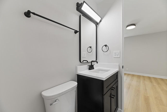 18624 W Pamela Pl, Gurnee, IL 60031 - bathroom with vanity, toilet, and wood finished floors