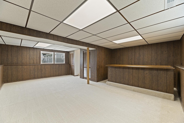 18624 W Pamela Pl, Gurnee, IL 60031 - finished basement featuring wooden walls, carpet floors, a bar, and a drop ceiling