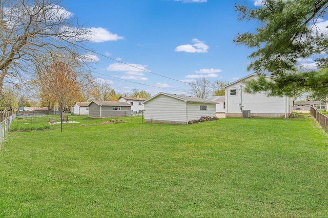 18624 W Pamela Pl, Gurnee, IL 60031 - view of yard featuring central air condition unit and a fenced backyard