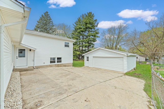 18624 W Pamela Pl, Gurnee, IL 60031 - exterior space with a garage, fence, and an outbuilding