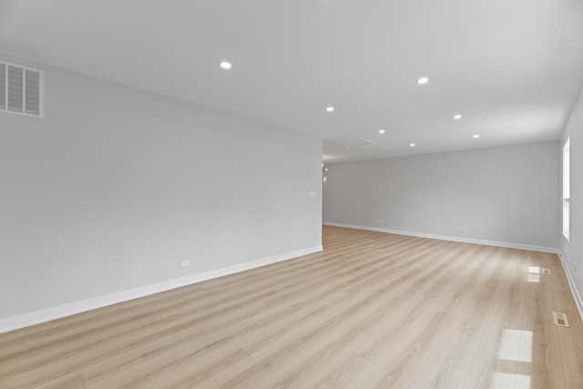 18624 W Pamela Pl, Gurnee, IL 60031 - spare room featuring baseboards, light wood finished floors, recessed lighting, and visible vents
