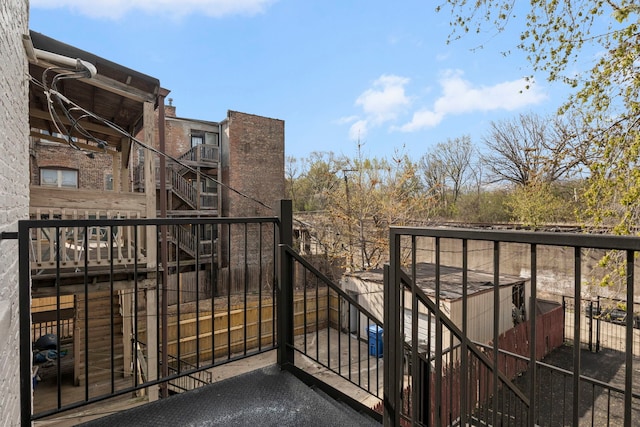 balcony featuring stairway