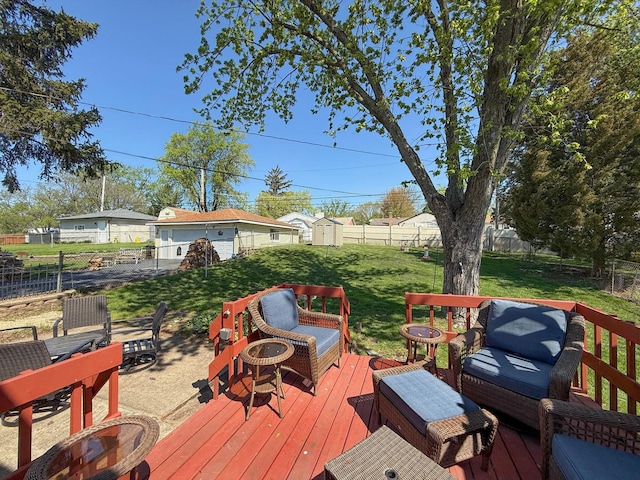deck featuring a yard, an outdoor hangout area, and a fenced backyard