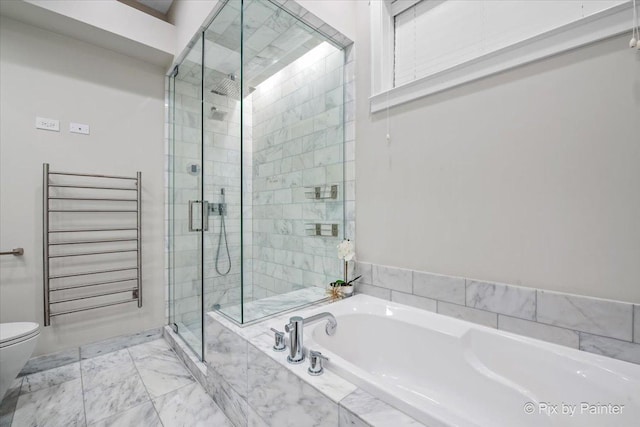 bathroom featuring radiator, a stall shower, toilet, and a garden tub