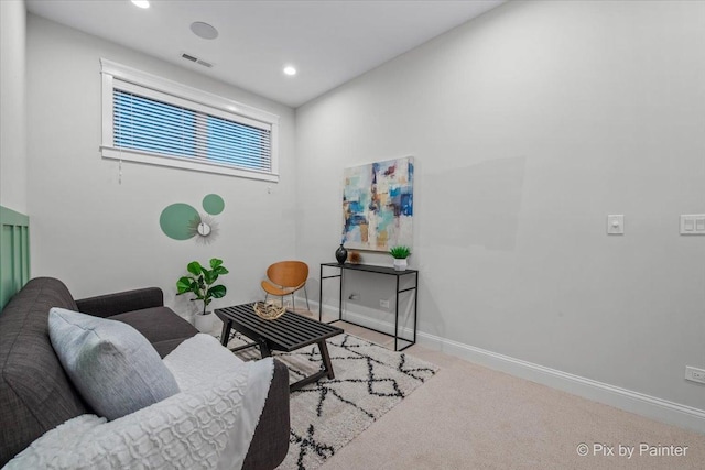 living area featuring baseboards, recessed lighting, carpet floors, and visible vents