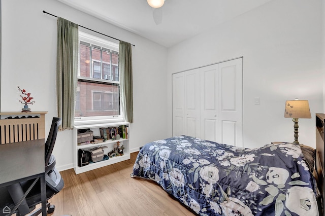 6102 S Kimbark Ave Unit 1W, Chicago, IL 60637 - bedroom with a ceiling fan, wood finished floors, and a closet