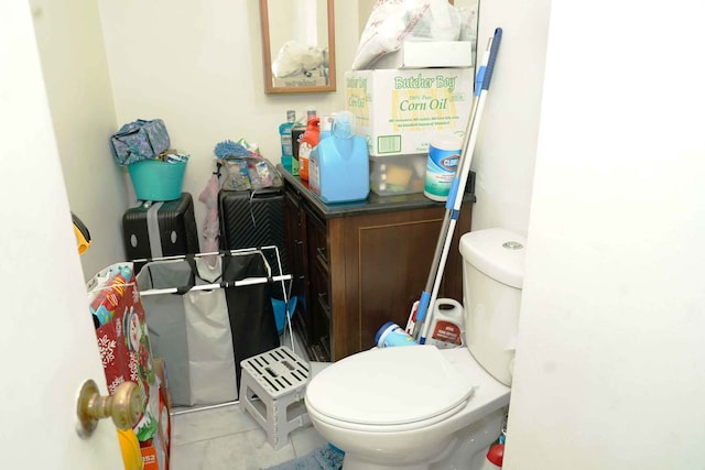 bathroom featuring tile patterned flooring and toilet