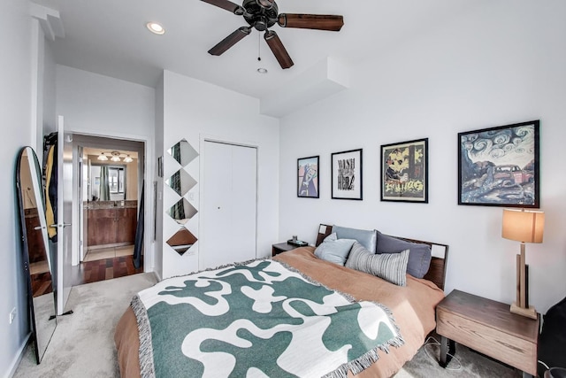 carpeted bedroom with ceiling fan, ensuite bathroom, a closet, and recessed lighting