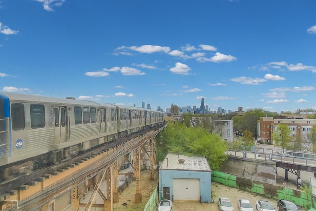 surrounding community with a view of city and a garage