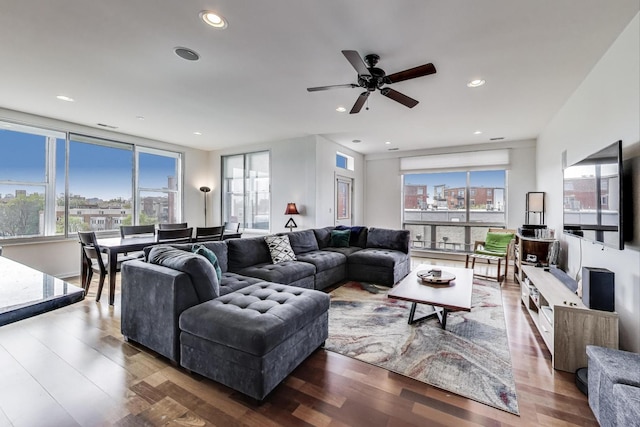 living room featuring recessed lighting, ceiling fan, and wood finished floors