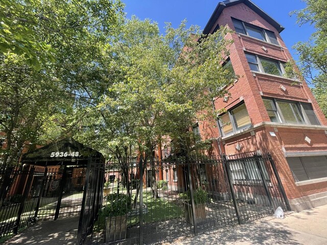 view of property with a fenced front yard