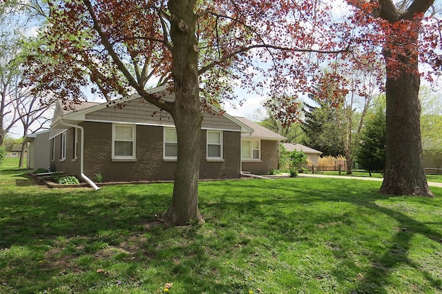 exterior space with a lawn