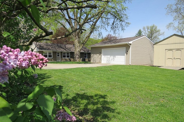 view of yard with a storage shed and an outdoor structure