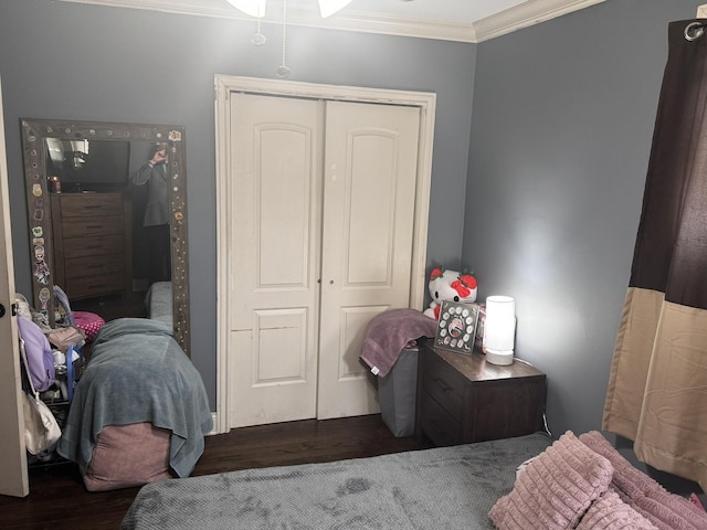 3825 W Pippin St, Chicago, IL 60652 - bedroom with ornamental molding, a closet, and wood finished floors