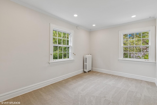 283 Ridge Ave, Winnetka, IL 60093 - spare room featuring radiator heating unit, ornamental molding, baseboards, carpet, and recessed lighting