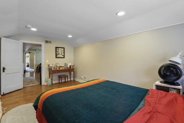111 E Palatine Rd, Palatine, IL 60067 - bedroom featuring visible vents, recessed lighting, wood finished floors, and lofted ceiling