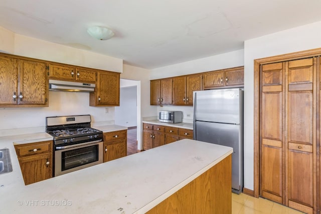 2339 N James Ct, Arlington Heights, IL 60004 - kitchen featuring stainless steel appliances, under cabinet range hood, light countertops, and brown cabinetry