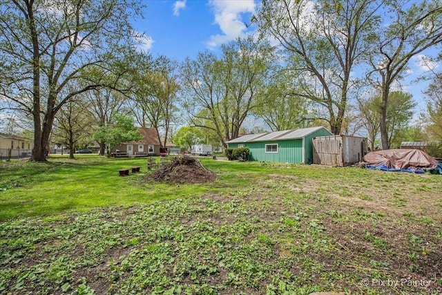 2381 Elm Rd, West Chicago, IL 60185 - view of green lawn featuring an outbuilding