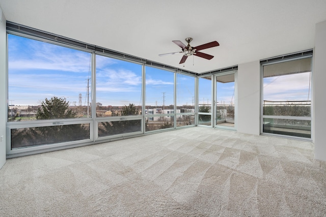 9715 Woods Dr Unit 700, Skokie, IL 60077 - unfurnished sunroom with carpet floors and plenty of natural light