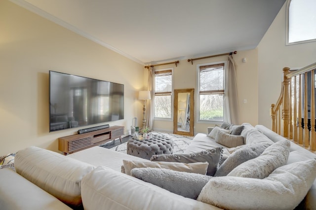 living room featuring crown molding