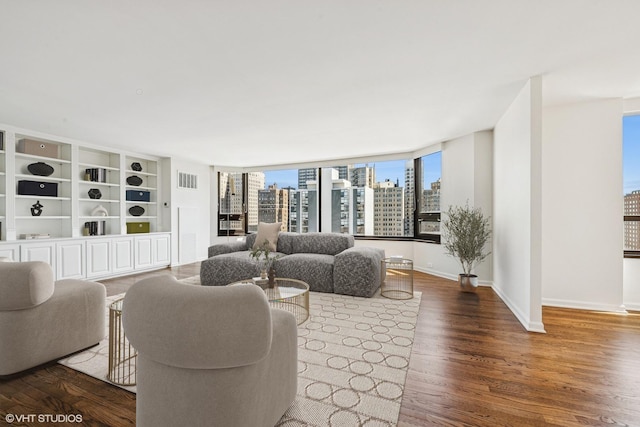 1410 N State Pkwy Unit 17B, Chicago, IL 60610 - living room featuring a city view and wood finished floors