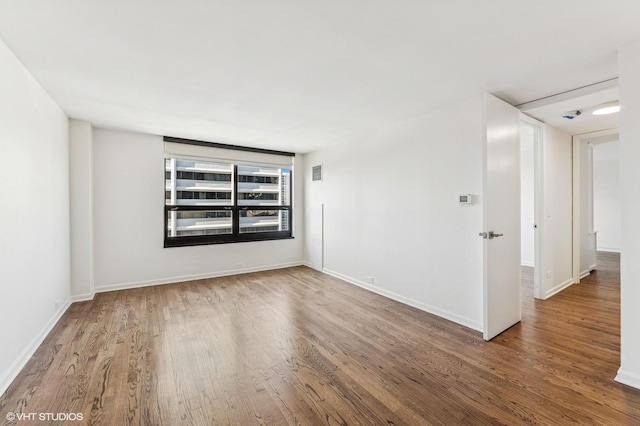 1410 N State Pkwy Unit 17B, Chicago, IL 60610 - spare room with wood finished floors and baseboards