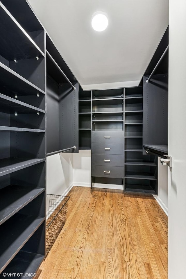 1410 N State Pkwy Unit 17B, Chicago, IL 60610 - walk in closet featuring wood finished floors