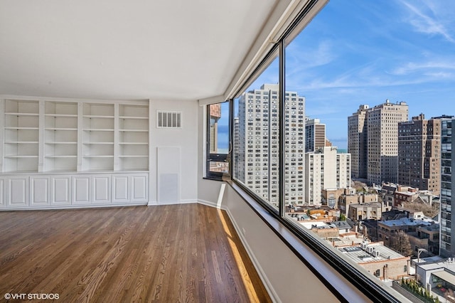 1410 N State Pkwy Unit 17B, Chicago, IL 60610 - unfurnished sunroom with a view of city